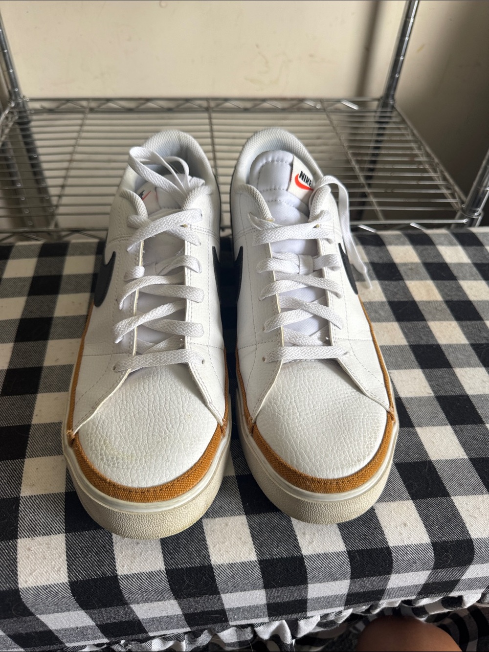 Nike Men’s White Low-Top Sneakers with Tan Accent and Black Swoosh